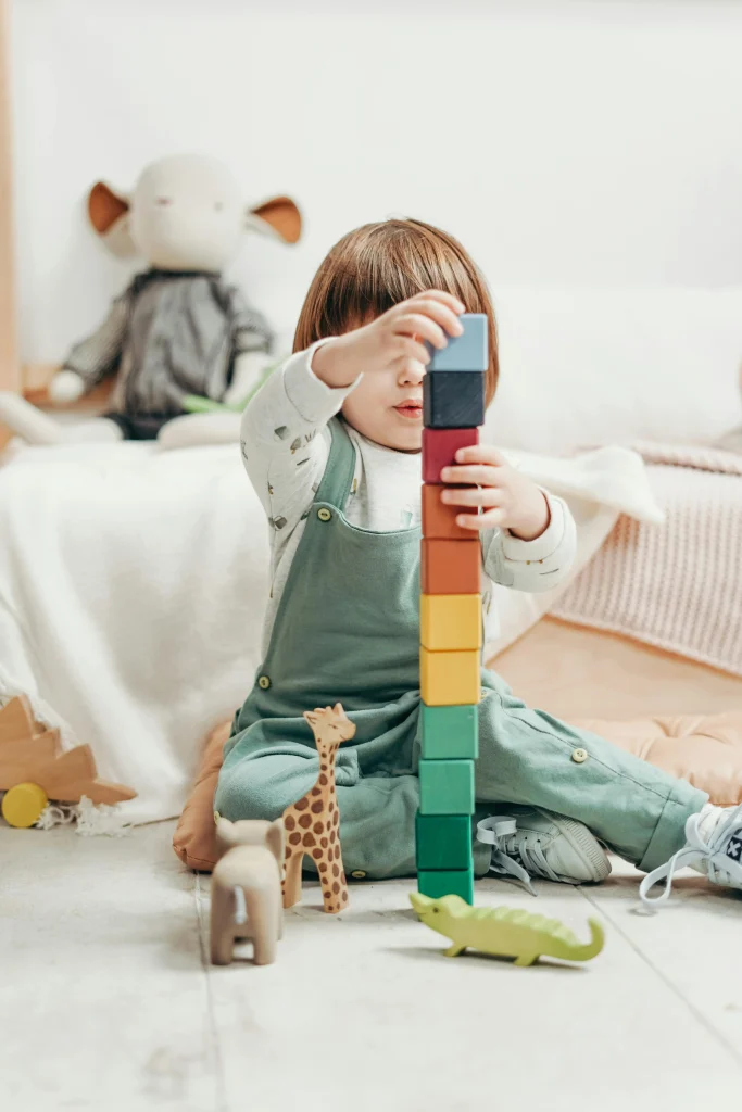 kid playing with blocks